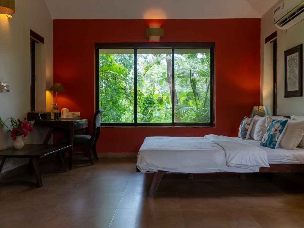 Calm and airy bedroom at Mango Beach House Awas, Alibaug