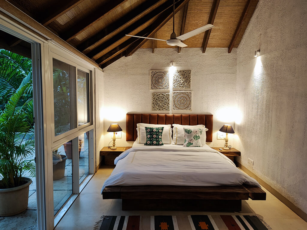 Elegant bedroom at Mango Villa, luxury villa with private pool in Alibaug on rent