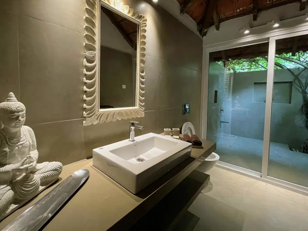 Boutique villa bathroom at Mango Villa Alibaug with contemporary fittings
