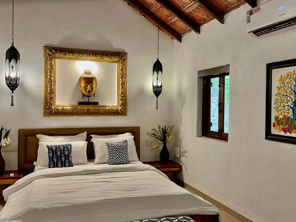 Luxury bedroom at Mango Villa in Alibaug with heritage decor