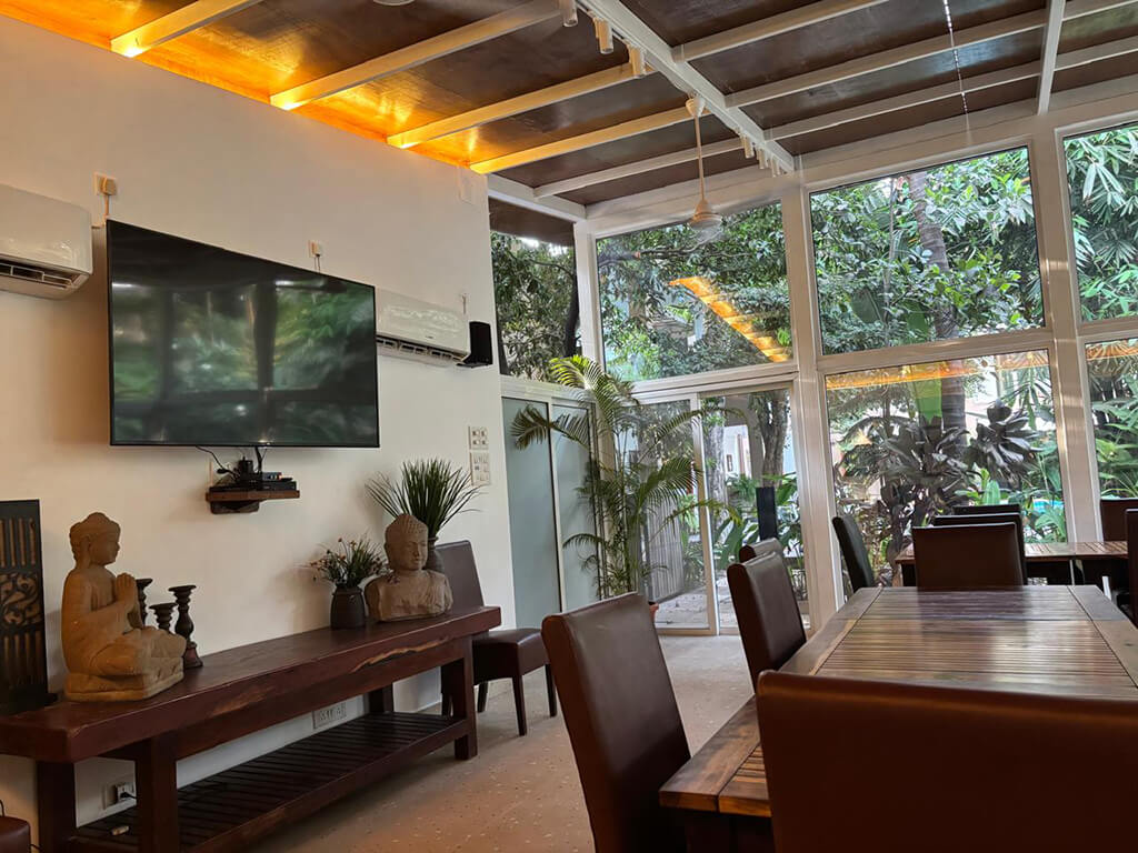 Spacious dining area at Mango Baug Kihim holiday homes in Alibaug.