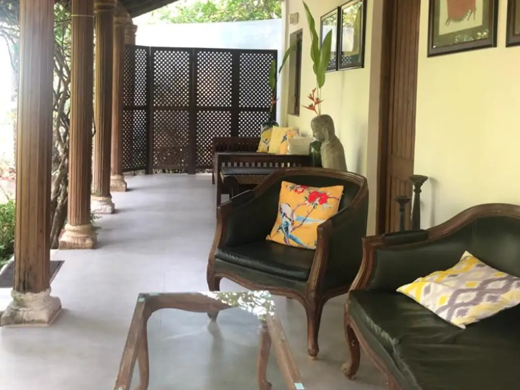 Relaxing sit-out veranda at Casa Mango villa in Alibaug